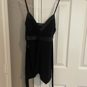 Black v neck tank top with tie behind the back from wet seal. No size tag